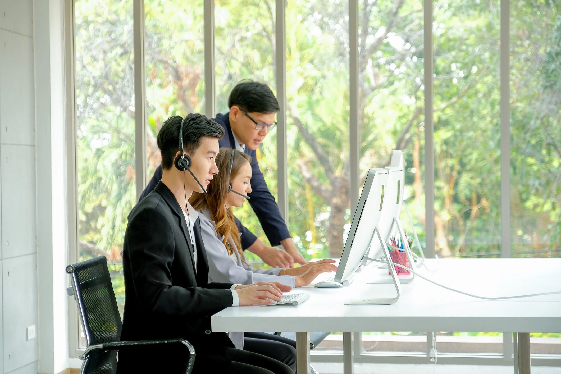 Customer support team assisting online shoppers