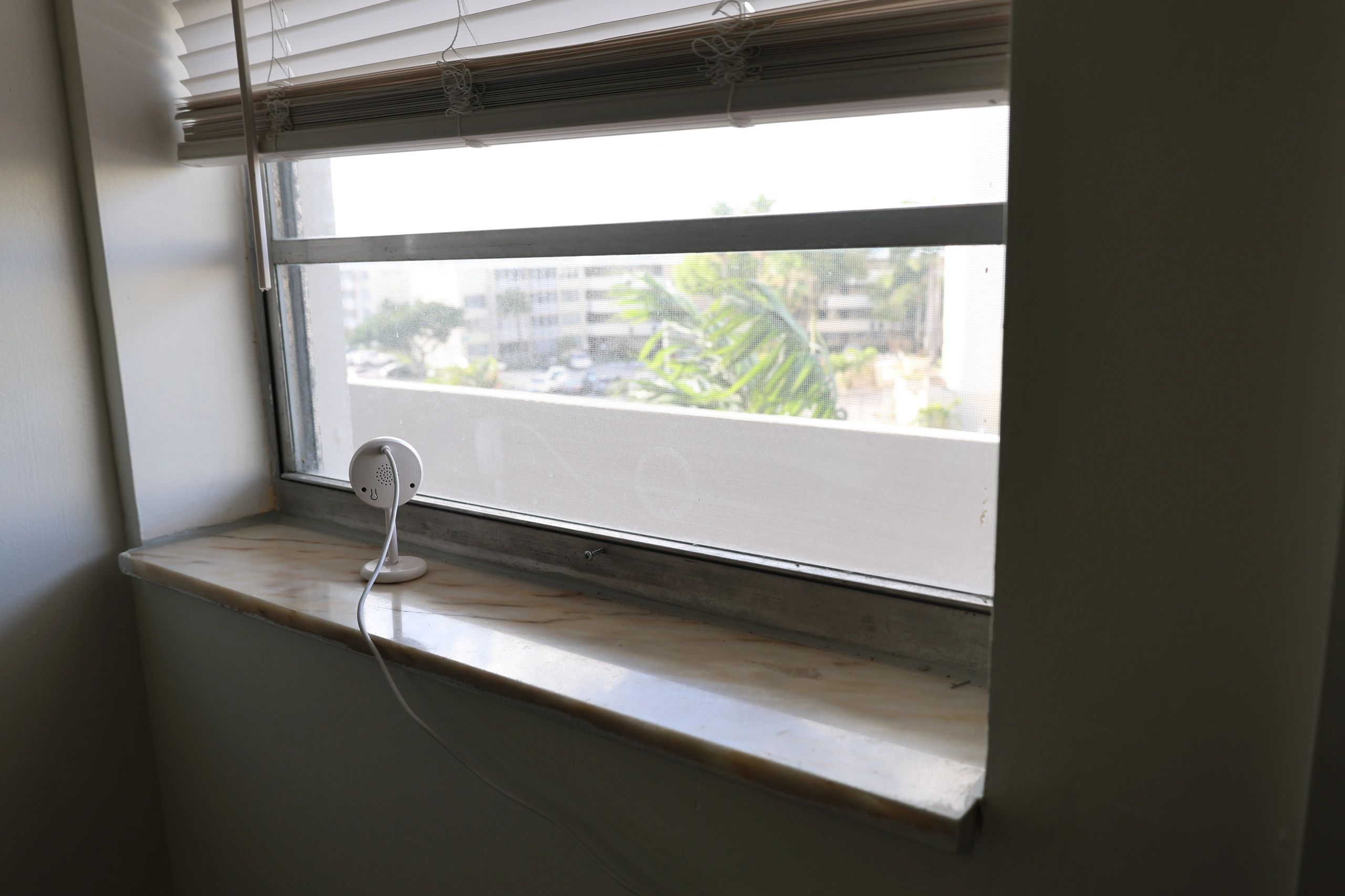 Indoor security camera placed on a windowsill